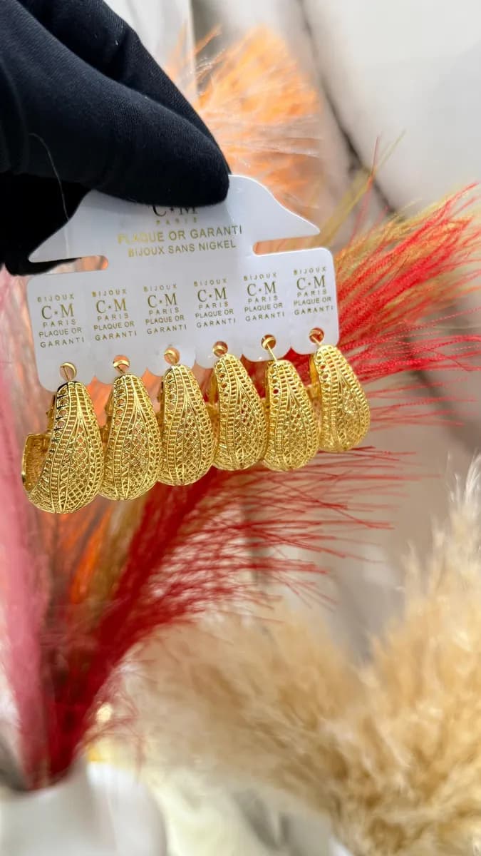   Arrivage des boucles imitation sunbelle   3